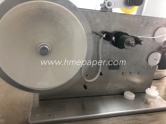comprar Máquina de enrolar fita de papel de filtro HME acionada pneumaticamente para produtos de 20-150 mm online manufacture