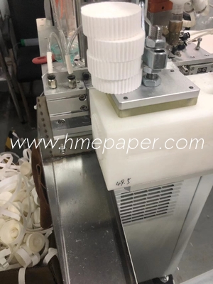 comprar Máquina de enrolar fita de papel de filtro HME controlada por PLC HMEF para produtos de 22 a 60 mm online manufacture